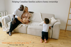 Young interacial family with a child who are fist time home buyers, sitting in the living room of their newly purchased home.